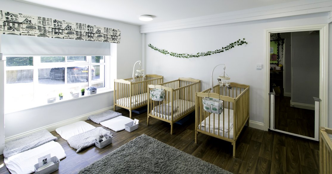 Outdoor playing area for nursery children at Busy Bees Guildford Fitzsimmons